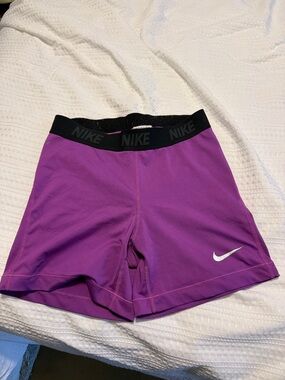 Nike Women's Purple Athletic Shorts with Black Waistband